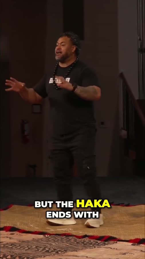 A speaker performing the haka in the campus chapel.
