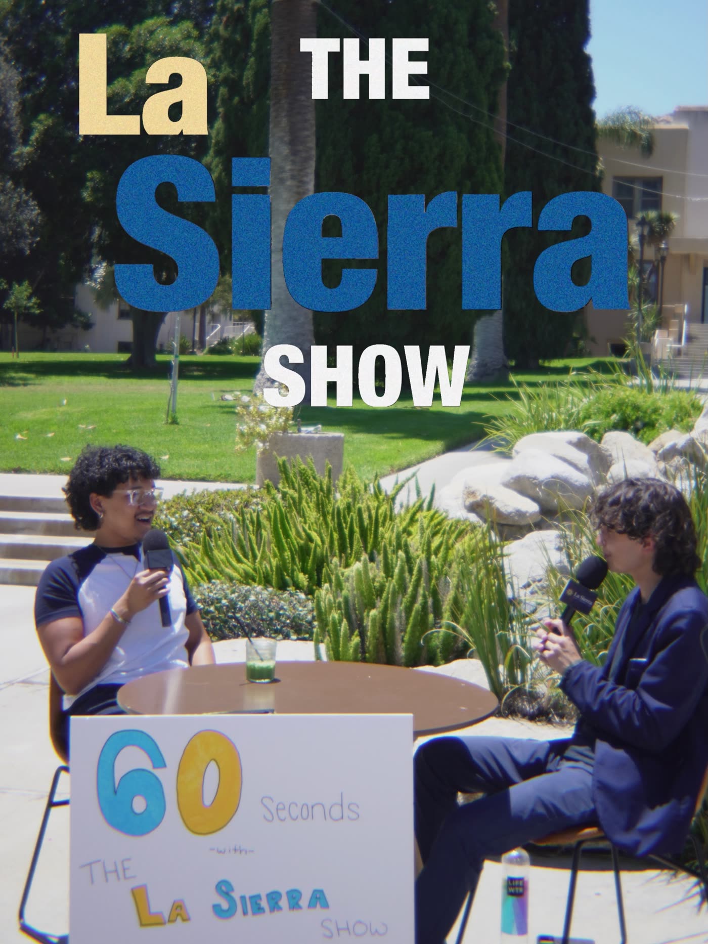 Two guests seated at a table on the campus lawn under a La Sierra Show title card.